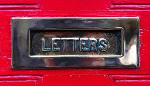 Letterbox on a red door