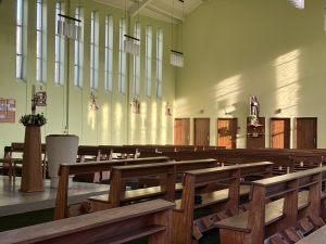 St Brigid’s church interior with sun beaming through the windows
